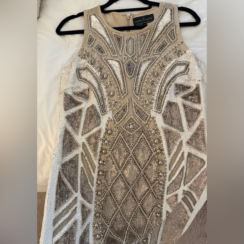 Adorable needle and thread dress!